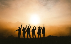 Group of friends by the sunset